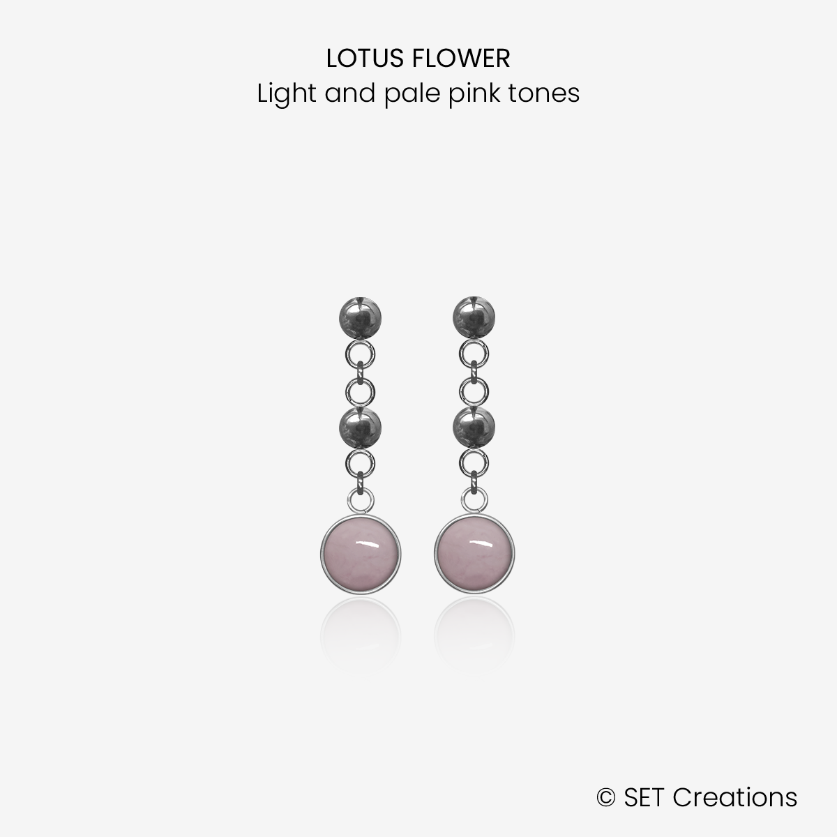 1 pair of 6mm fused glass circular cabochons set into steel bases, attached to steel ball studs via steel ball connectors. Cabochon colour: Lotus Flower = light and pale pink marble effect.