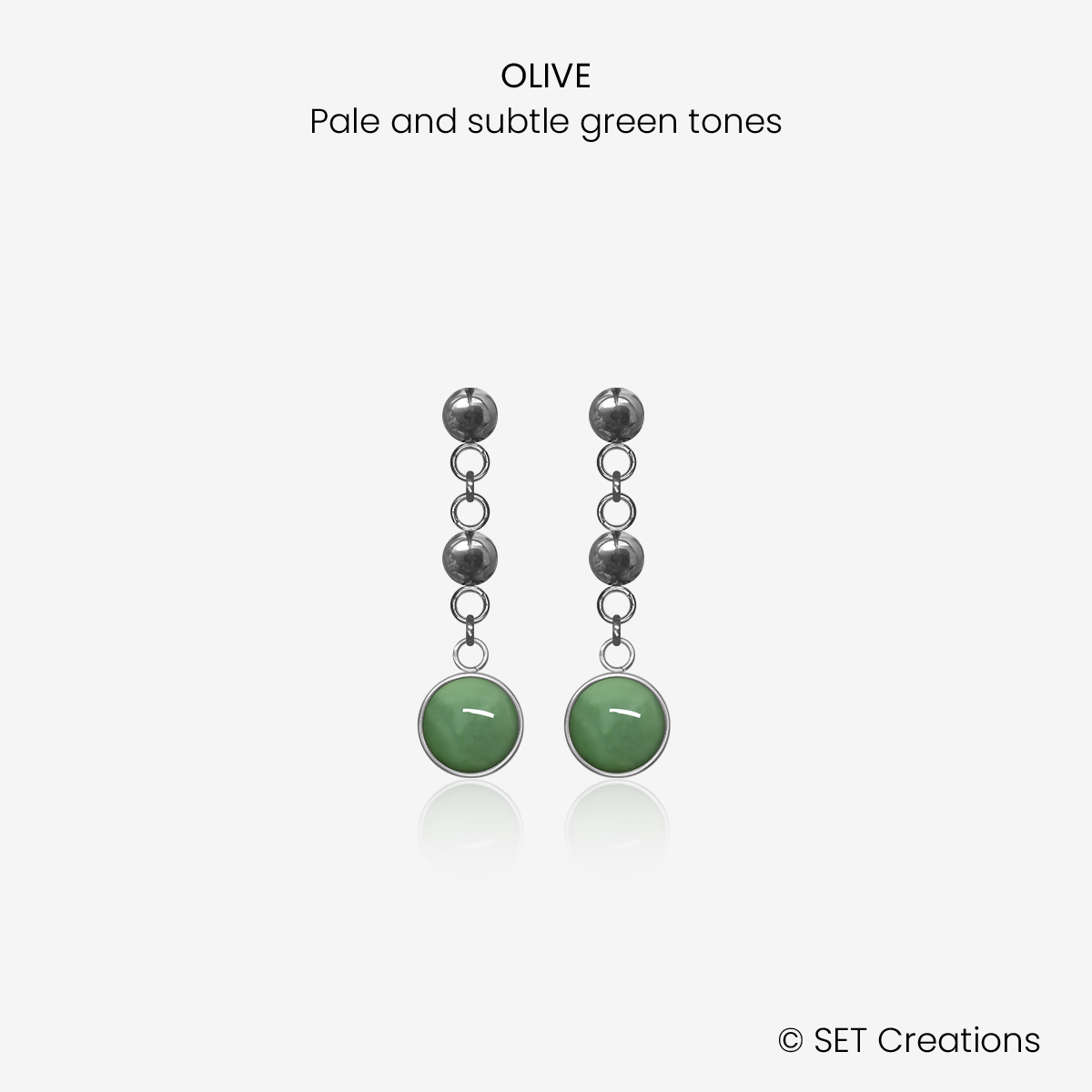 1 pair of 6mm fused glass circular cabochons set into steel bases, attached to steel ball studs via steel ball connectors. Cabochon colour: Olive = pale and subtle green marble effect.