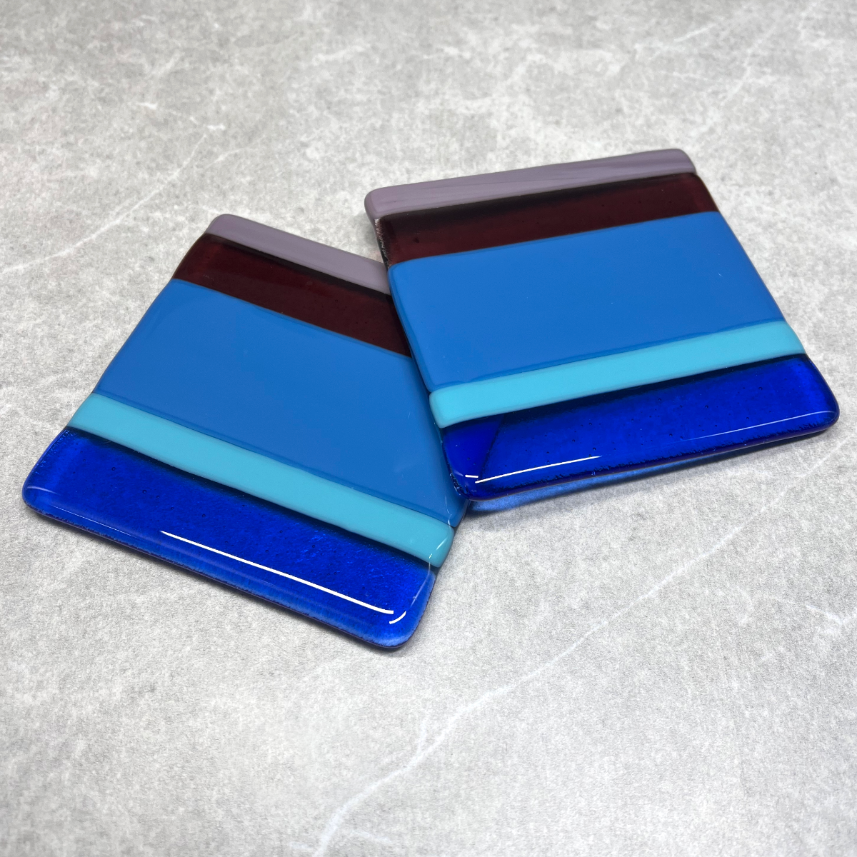fused glass square coasters. Size 100mm X 100mm. Blue, Turquoise and purple stripes. Set of 2