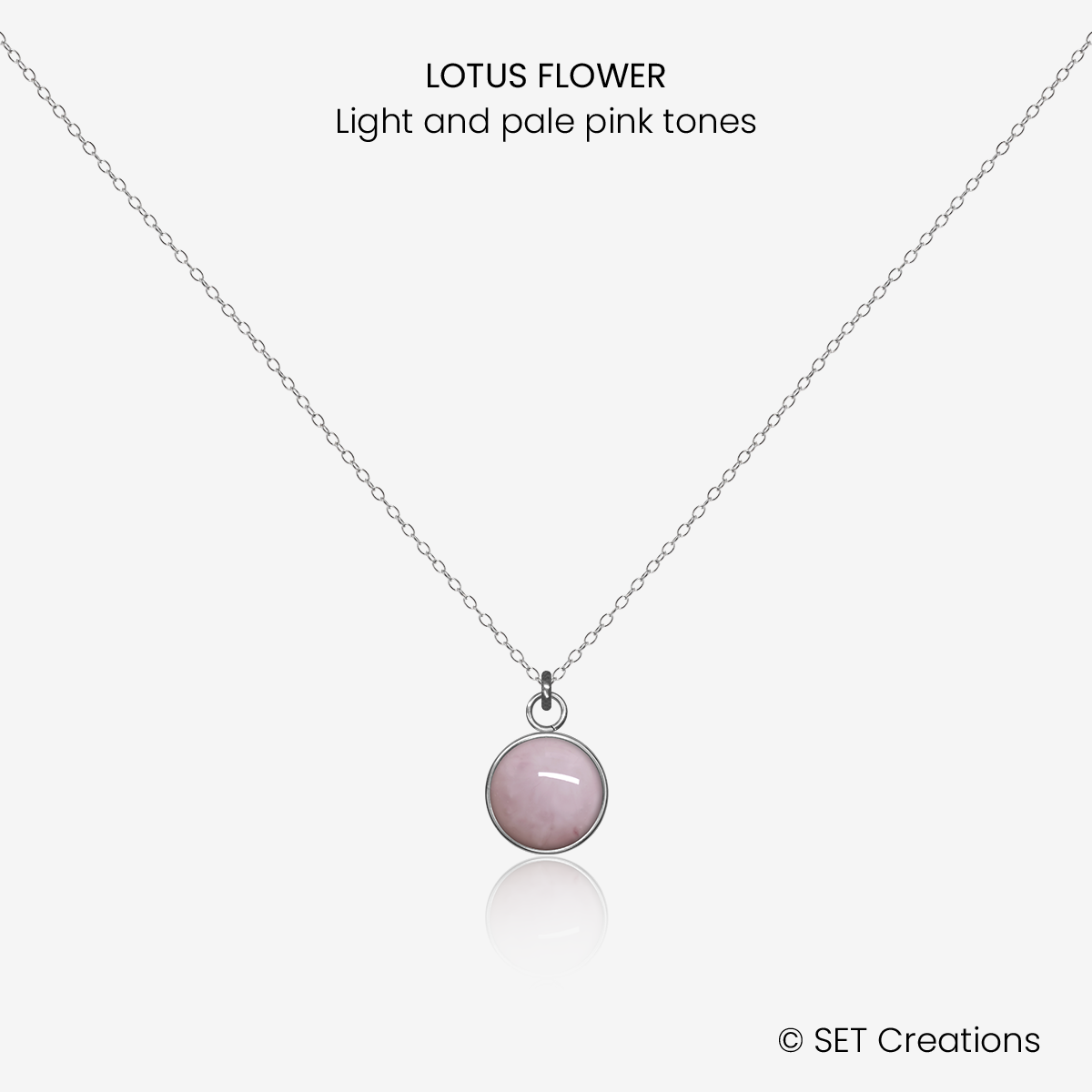 8mm fused glass circular cabochon set into a steel base and attached to a 500mm stainless steel pendant chain via jump ring. Cabochon colour: Lotus Flower = light and pale pink marble effect.